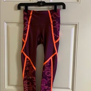 Under Armour work out pants. Purple and orange